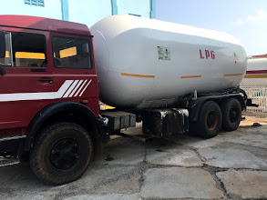 Go-Gas bulk LPG delivery tanker truck supplying a commercial business in Ghana